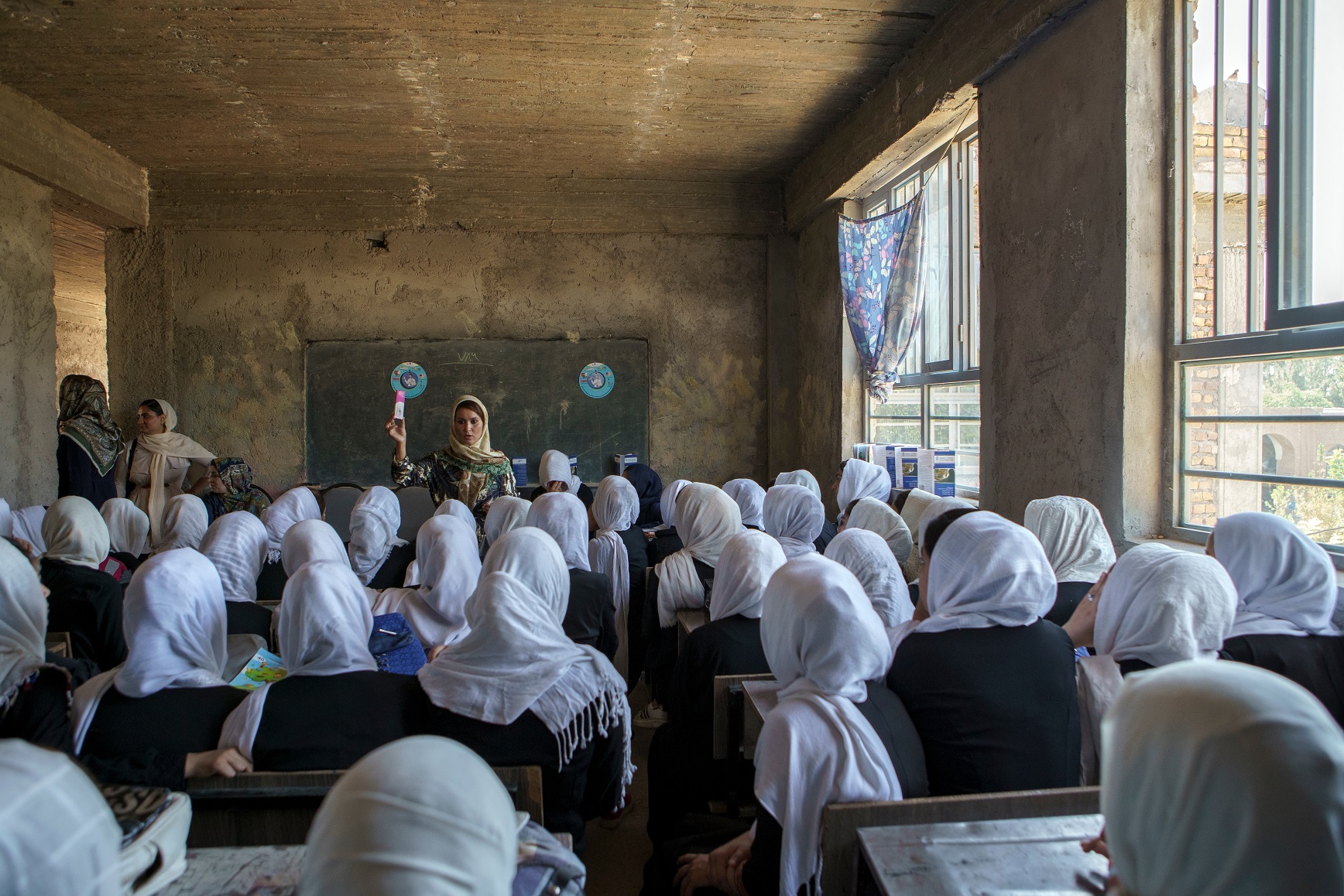 shutterstock 2036778914   Afghan girls at school in Herat. Afghanistan.2019